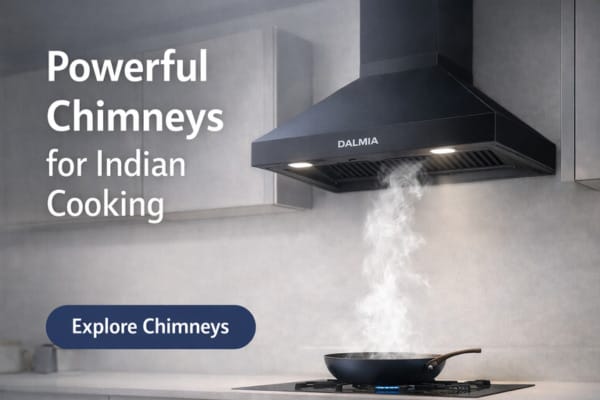 Dalmia black kitchen chimney removing smoke from Indian cooking with powerful suction in modern kitchen