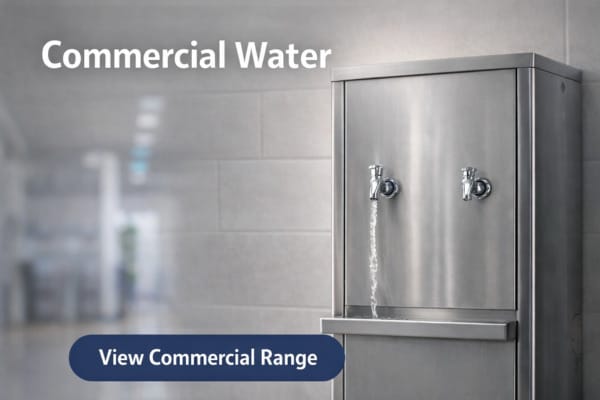Dalmia stainless steel commercial water cooler with dual taps installed in public or commercial space